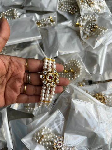 Elegant Pearl Beaded Bracelet with Gold Floral Design